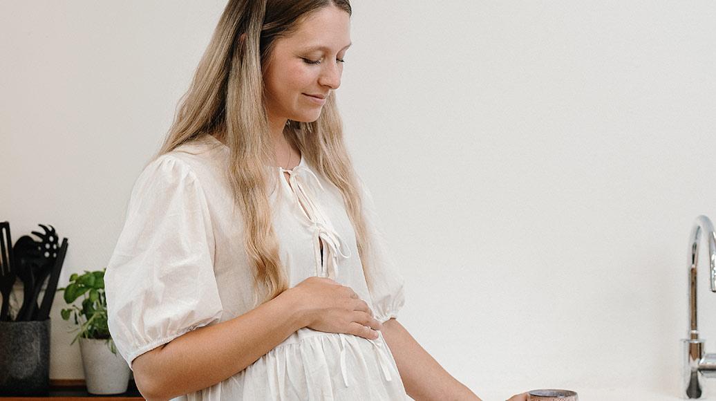 Gravid kvinde med barn